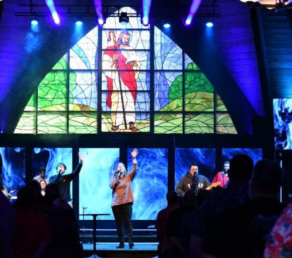 Lakeview Christian Church worship service with band and congregation in Portage Lakes, Akron, OH, raising hands in praise