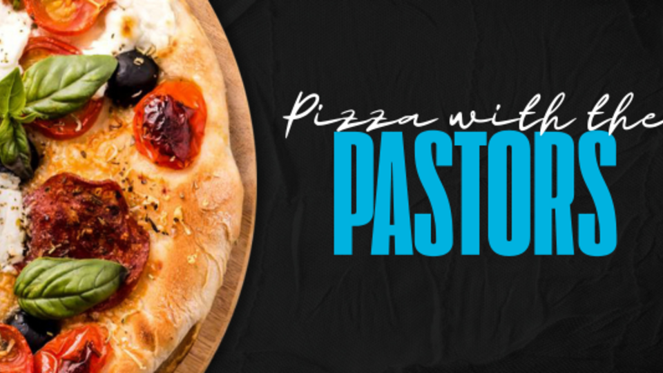Delicious pizza on wooden board with 'Pizza with the Pastors' text, Lakeview Christian Church community event
